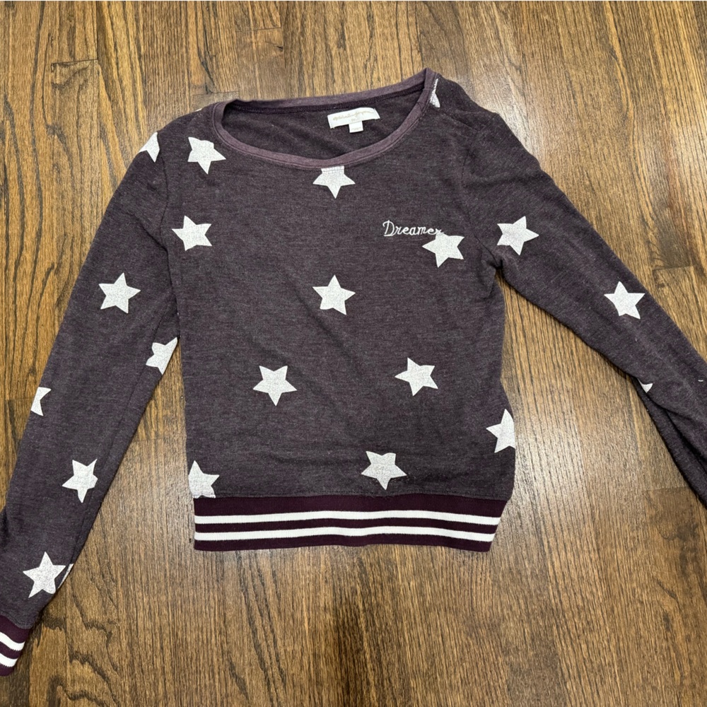 Spiritual gangster star/dreamer sweatshirt.